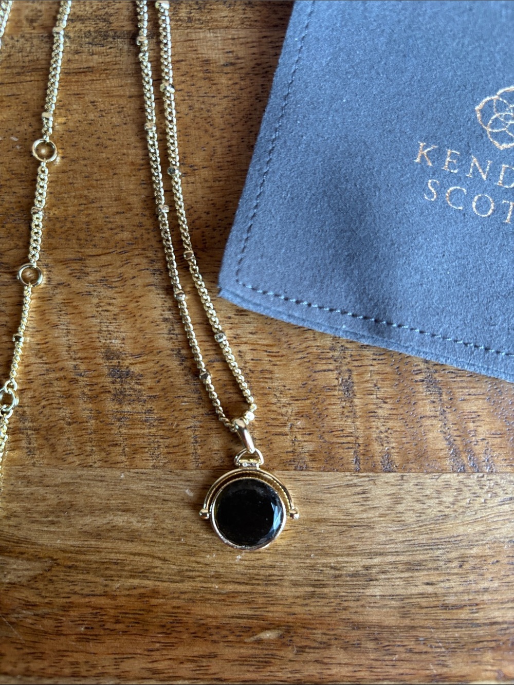 Kendra Scott Gold Necklace with Black Disc Pendant